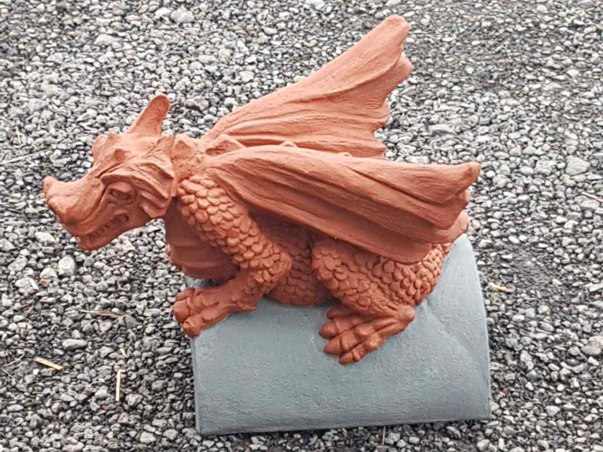 slate grey and terracotta dragon finial