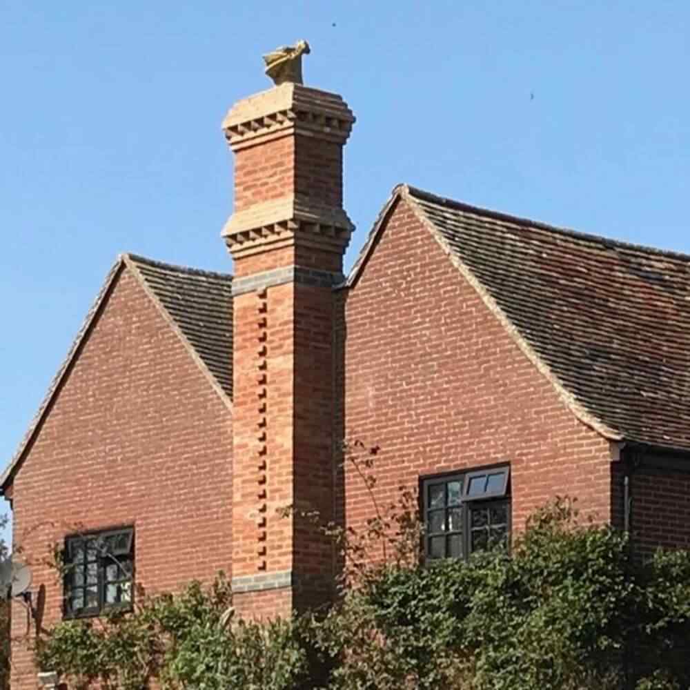 buff_yellow_two_tone_dragon_chimney_pot_installed_brick